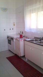 A kitchen or kitchenette at Fronte del Porto