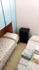 A bed or beds in a room at Fronte del Porto