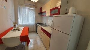 Kuchyň nebo kuchyňský kout v ubytování Apartments Jadranka