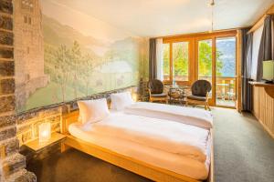 Katil atau katil-katil dalam bilik di Hotel Lindenhof by Crossworld AG