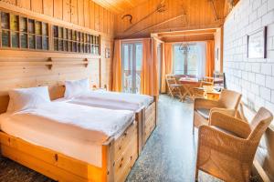 Katil atau katil-katil dalam bilik di Hotel Lindenhof by Crossworld AG