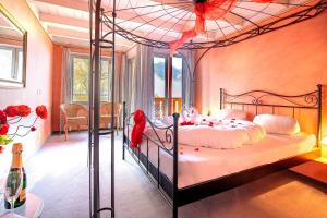 Katil atau katil-katil dalam bilik di Hotel Lindenhof by Crossworld AG