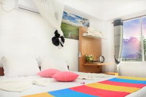 Letto o letti in una camera di Sigiriya Water Guest & View Point Restaurant