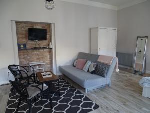 TV a/nebo společenská místnost v ubytování Óváros Apartman