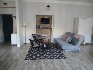 TV a/nebo společenská místnost v ubytování Óváros Apartman