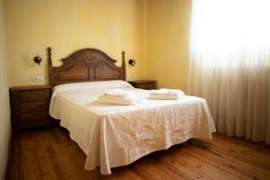 Posteľ alebo postele v izbe v ubytovaní Casa Rural La Tina