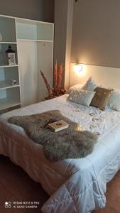 Ένα ή περισσότερα κρεβάτια σε δωμάτιο στο FINCA VERDE