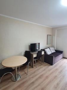 TV a/nebo společenská místnost v ubytování Apartment 607 in ORBI PALACE