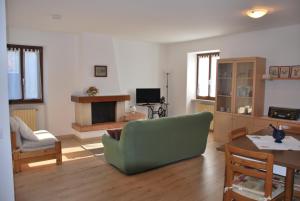 TV a/nebo společenská místnost v ubytování Al Piccolo Borgo Antico