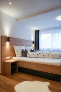Posteľ alebo postele v izbe v ubytovaní Ferienwohnung Ladner