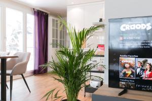 TV a/nebo společenská místnost v ubytování Spirit Apartments - Balkon - Bergsicht - Parkplatz