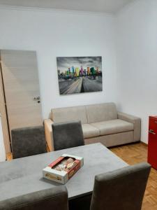 A seating area at Appartamento ALECATIA 2
