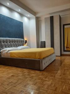 A bed or beds in a room at Appartamento ALECATIA 2