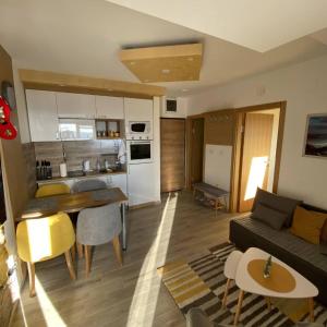 A kitchen or kitchenette at APARTMAN FEELING