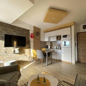 A kitchen or kitchenette at APARTMAN FEELING