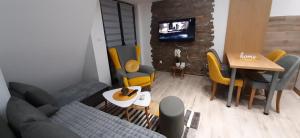 A television and/or entertainment centre at APARTMAN FEELING