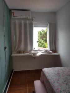 Postel nebo postele na pokoji v ubytování Cantinho Da Josete Apartamento + 43 fotografií