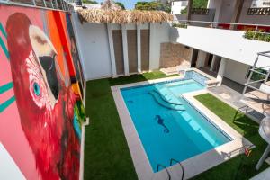 A view of the pool at Hotel Boutique CASA CHUNUU Santa Marta or nearby