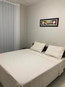 Katil atau katil-katil dalam bilik di Apartamento na Reserva Imbassai +24 gambar