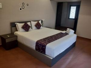 Sremethila Homestay客房内的一张或多张床位