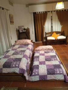Postel nebo postele na pokoji v ubytování Habitación Gabriela Mistral