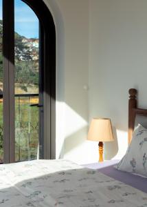 Postel nebo postele na pokoji v ubytování Hè Maison Boutique Stay & café