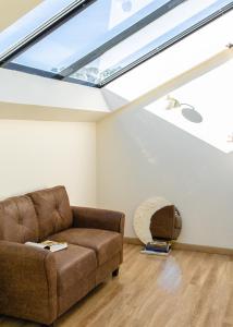 Posezení v ubytování Hè Maison Boutique Stay & café