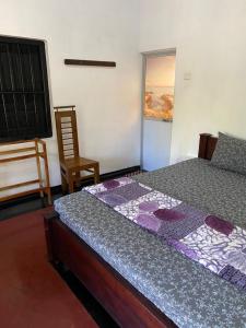 Voodi või voodid majutusasutuse Ami place Rooms with Kitchen toas