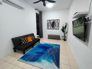 Area tempat duduk di Kak Zai Homestay Port Dickson With Private Pool