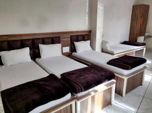 Postel nebo postele na pokoji v ubytování Hotel Milan + 37 fotografií