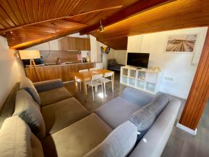 a living room with a couch and a table at Flats Company - Karakoy Apartment in Istanbul