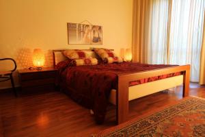 A bed or beds in a room at Nuovo Mondo