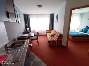 Гостиная зона в BodenSEE Gästehaus Tettnang ALBERGO