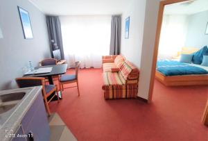 Posezení v ubytování BodenSEE Gästehaus Tettnang ALBERGO
