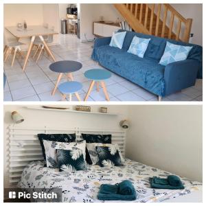 a living room with a blue couch and a table at Maison La Baliere,2 chambres,5 personnes, à 20 minutes du Puy du Fou in Pouzauges