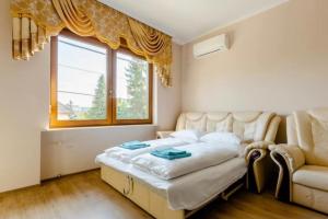 Posteľ alebo postele v izbe v ubytovaní Deviza Apartments