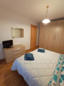 Postel nebo postele na pokoji v ubytování CASITA Locazione Turistica
