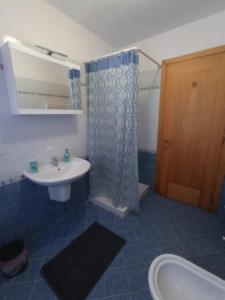 Koupelna v ubytování CASITA Locazione Turistica