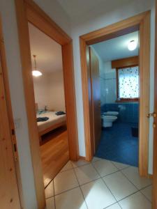 Postel nebo postele na pokoji v ubytování CASITA Locazione Turistica