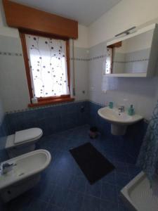 Koupelna v ubytování CASITA Locazione Turistica + 2 fotografie