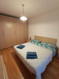 Postel nebo postele na pokoji v ubytování CASITA Locazione Turistica