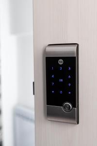 an apple ipod is attached to a door at Apartmani Park Maksimir-Rebro in Zagreb