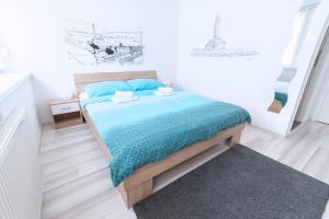 Posteľ alebo postele v izbe v ubytovaní The Dots Hostel