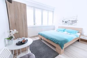 Posteľ alebo postele v izbe v ubytovaní The Dots Hostel