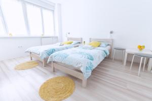 Posteľ alebo postele v izbe v ubytovaní The Dots Hostel