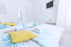 Posteľ alebo postele v izbe v ubytovaní The Dots Hostel