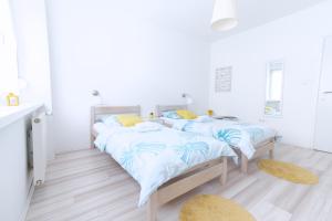 Posteľ alebo postele v izbe v ubytovaní The Dots Hostel