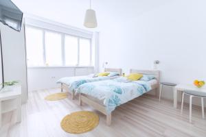 Posteľ alebo postele v izbe v ubytovaní The Dots Hostel