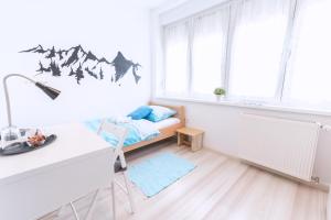 Posteľ alebo postele v izbe v ubytovaní The Dots Hostel