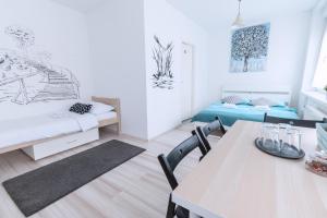 Posteľ alebo postele v izbe v ubytovaní The Dots Hostel